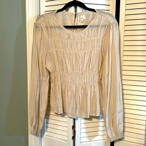 New without tags. Never worn. Adorable top cinched in at waist